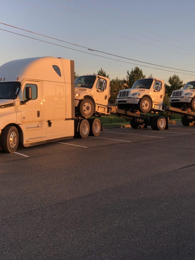 auto truck tranpsort services, truck transporting